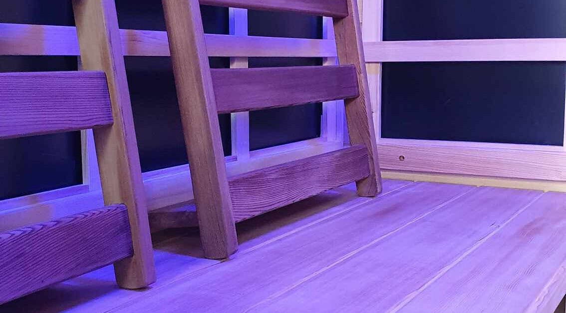 Wooden sauna interior at Sauna, Compression Boots, Cold Plunge, Chatsworth, Queensland, AU.