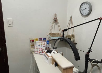 Cozy nail art station at Serene Sparkle, Davao City, Davao Region, PH, featuring manicure tools and supplies.