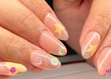 Intricate nail art design with stars and glitter at Serene Sparkle, Davao City, Davao Region, PH.