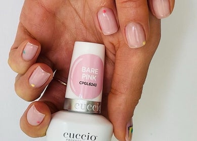 Close-up of manicured nails with 'Bare Pink' polish at Nikanails Pro, London, England, GB
