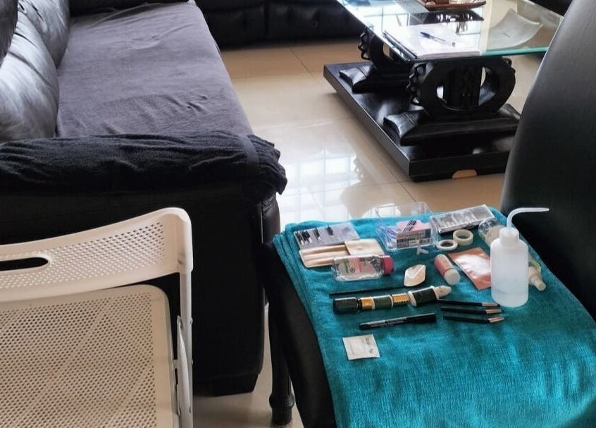 Makeup station at WhipLashed.gq in Gqeberha, Eastern Cape, ZA, with tools on a chair ready for beauty treatments.