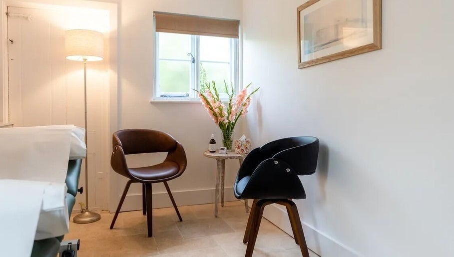 Relaxing lounge chairs at Molten&Muse Clinic in Hatfield, England, GB, creating a serene and inviting atmosphere.