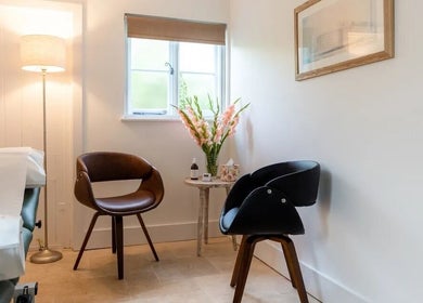 Relaxing lounge chairs at Molten&Muse Clinic in Hatfield, England, GB, creating a serene and inviting atmosphere.