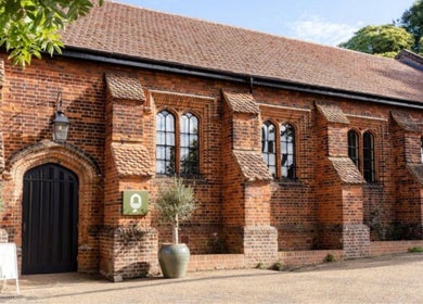 Exterior of Molten&Muse Clinic in a charming brick building, Hatfield, England, GB.