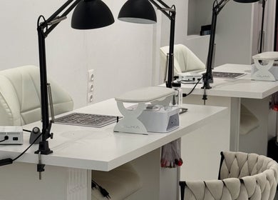 Modern nail station setup at Adela nail studio, Thessaloniki, GR offering luxurious manicure services.