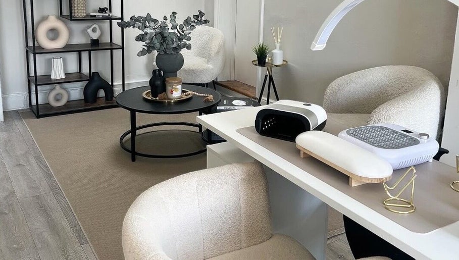 Elegant interior of Nailsbybry in Ampthill, England, GB with stylish nail stations and decor.