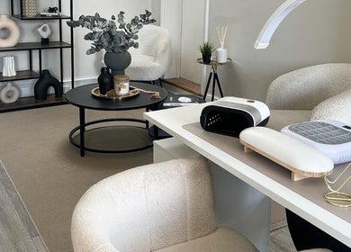 Elegant interior of Nailsbybry in Ampthill, England, GB with stylish nail stations and decor.