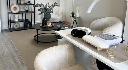 Elegant interior of Nailsbybry in Ampthill, England, GB with stylish nail stations and decor.