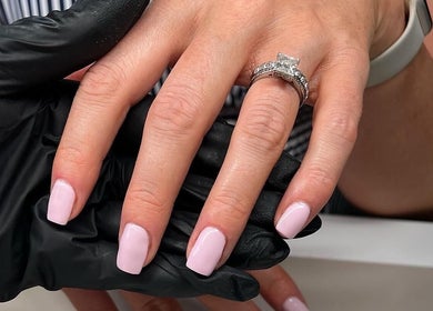 Fresh manicure with pink nails and jewelry at Nailsbybry, Ampthill, England, GB.
