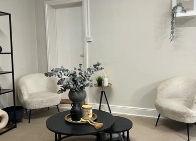Elegant waiting area at Nailsbybry, Ampthill, England, GB with modern chairs and stylish decor.