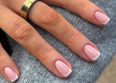 Sophisticated manicure with French tips at Nailsbybry, Ampthill, England, GB. Perfect for elegant occasions.