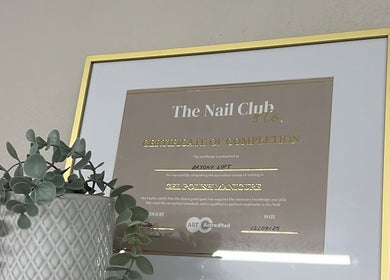 Nailsbybry in Ampthill, England showcases a framed certification of completion in nail artistry.