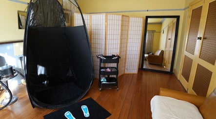 Serene spray tan corner at Inner Glow Studio, Melbourne, Victoria, AU with modern amenities.