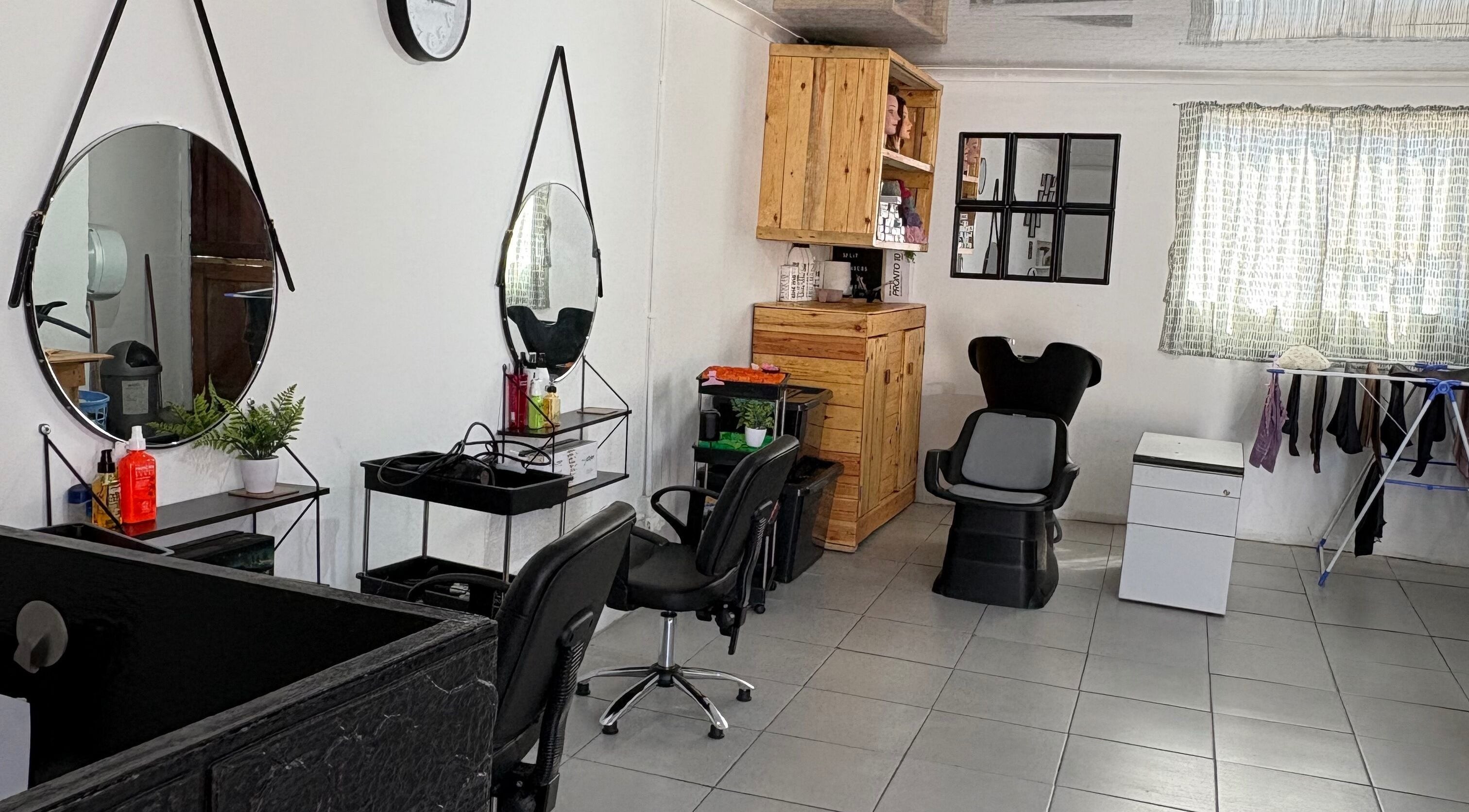 Modern salon interior at Split Enders by Lindré, Cape Town, Western Cape, ZA, showcasing stylish styling stations.