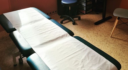 Treatment room at South London Chiropractic: East Dulwich, London, England, GB, featuring a professional table.