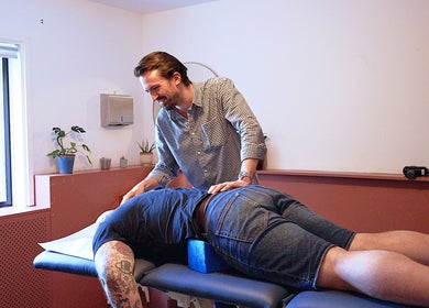 Chiropractor treating patient at South London Chiropractic: East Dulwich, London, England, GB.