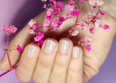 Elegant manicure with floral accents at Sunshine Nail Studio, Raunds, England, GB.