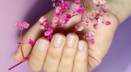 Elegant manicure with floral accents at Sunshine Nail Studio, Raunds, England, GB.