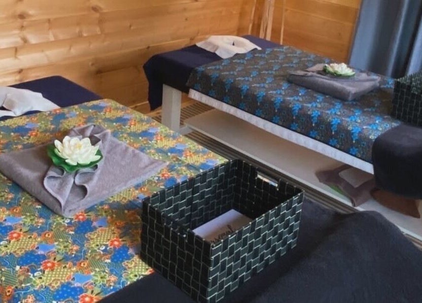 Massage beds with floral decor at Massage Loft (Drury), Auckland, Auckland, NZ. Relaxation awaits.