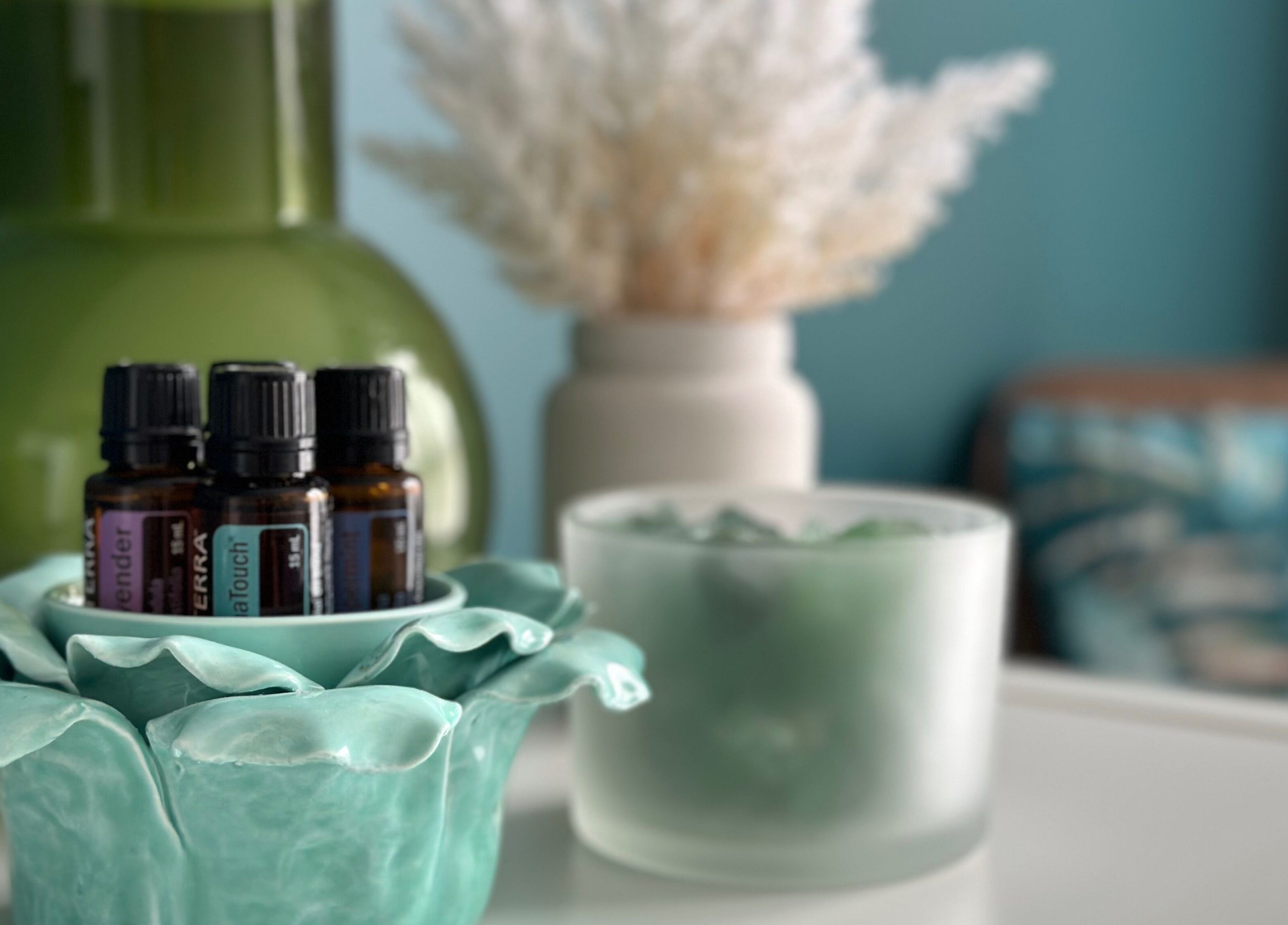 Essential oils displayed at Massage Loft (Drury), Auckland, NZ, creating a calming spa atmosphere.