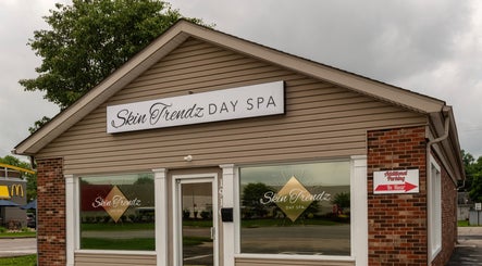 Exterior of Beauty Ink Cosmetic Solutions, Columbus, Indiana, US, showing welcoming spa entrance.