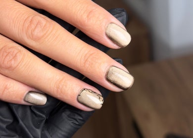 Elegant metallic nails at Lunea Beauty By Yvonne, Liverpool, England, GB showcasing expert manicure.