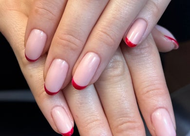 Elegant French manicure with red tips from Lunea Beauty By Yvonne, Liverpool, England, GB.