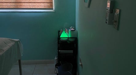 Relaxing green diffuser glow at Subrina’s Golden Touch therapeutic massage, Kingston, St. Andrew Parish, JM.