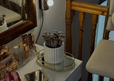 Elegant makeup station at Réalta Studio, County Mayo, IE featuring brushes and beauty products.