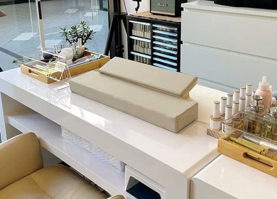 Chic manicure station at Genevieve's Nail & Eyelashes Salon, Southport, Queensland, AU with stylish tools ready.