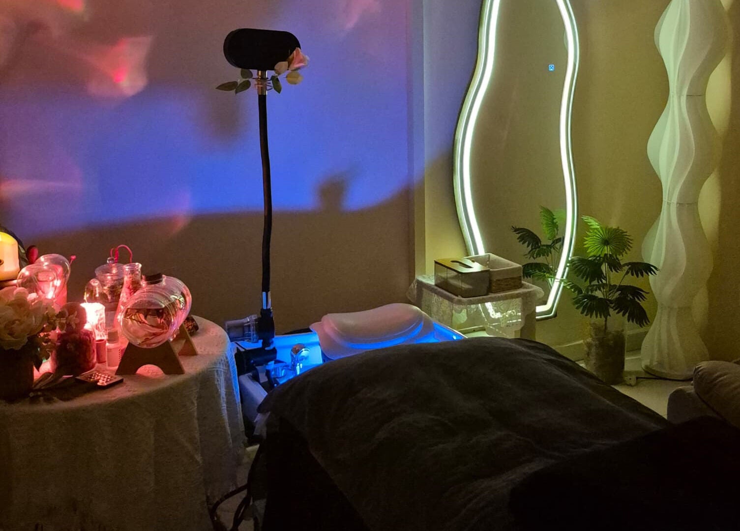 Tranquil headspa setup at Infinity Glow Headspa and Wellness, Petaling Jaya, Selangor, MY, with calming lights.