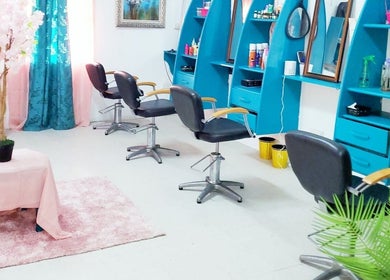 Chic salon setup at Renew Beauty Institute, Saint George's, Saint George, GD, with modern chairs and elegant decor.