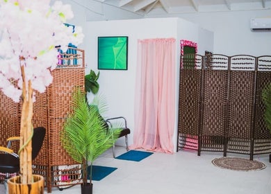 Relaxing interior at Renew Beauty Institute, Saint George's, Saint George, GD with woven screens and soft decor.