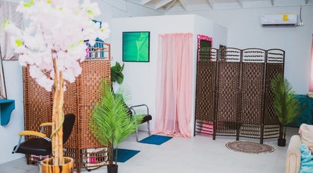 Relaxing interior at Renew Beauty Institute, Saint George's, Saint George, GD with woven screens and soft decor.