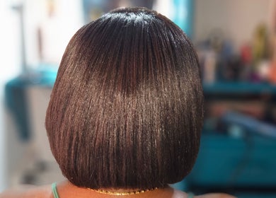 Sleek bob hairstyle showcased at Renew Beauty Institute, Saint George's, Saint George, GD.