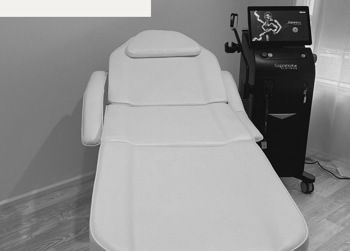 Modern treatment bed and equipment at LaserMe Clinic, Melbourne, Victoria, AU for effective skincare solutions.