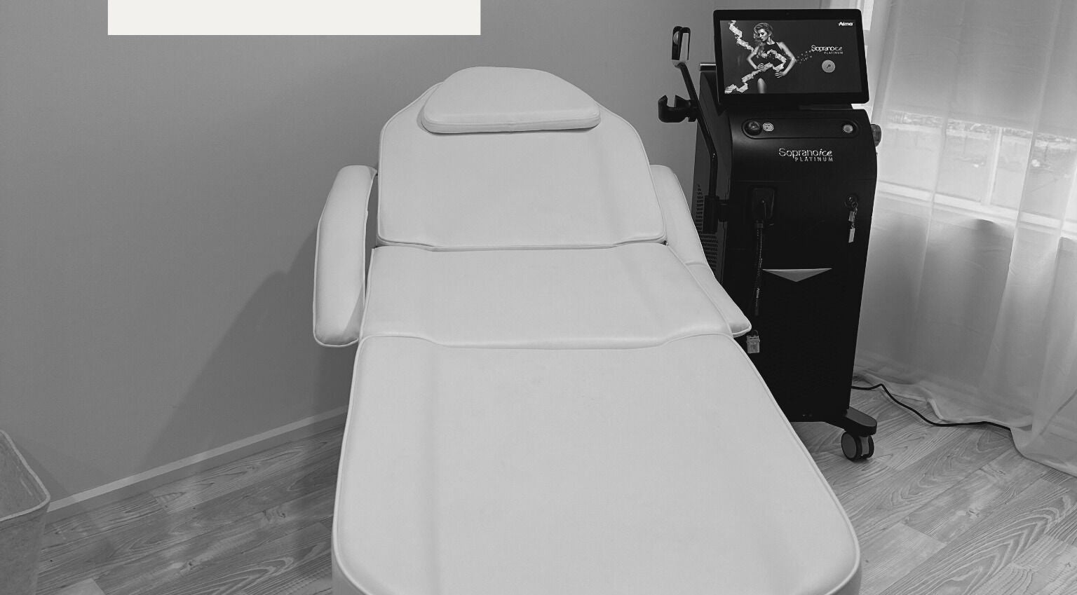 Modern treatment bed and equipment at LaserMe Clinic, Melbourne, Victoria, AU for effective skincare solutions.