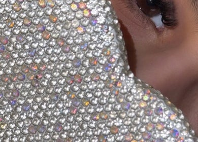 Close-up of a sparkling jewel mask beside an eye at Winxbycee, Rotherham, England, GB.