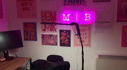Modestly Brow decor with neon sign and artwork in Manchester, England, GB.