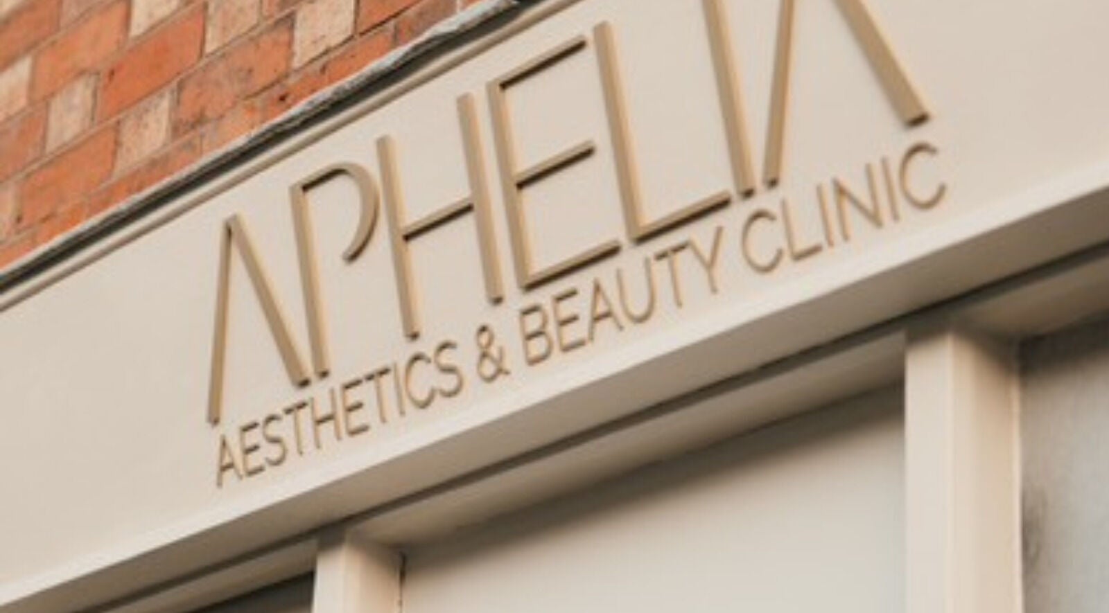 Entrance sign of Aphelia Aesthetics, Barrow Upon Soar, England, GB showcasing elegant lettering.