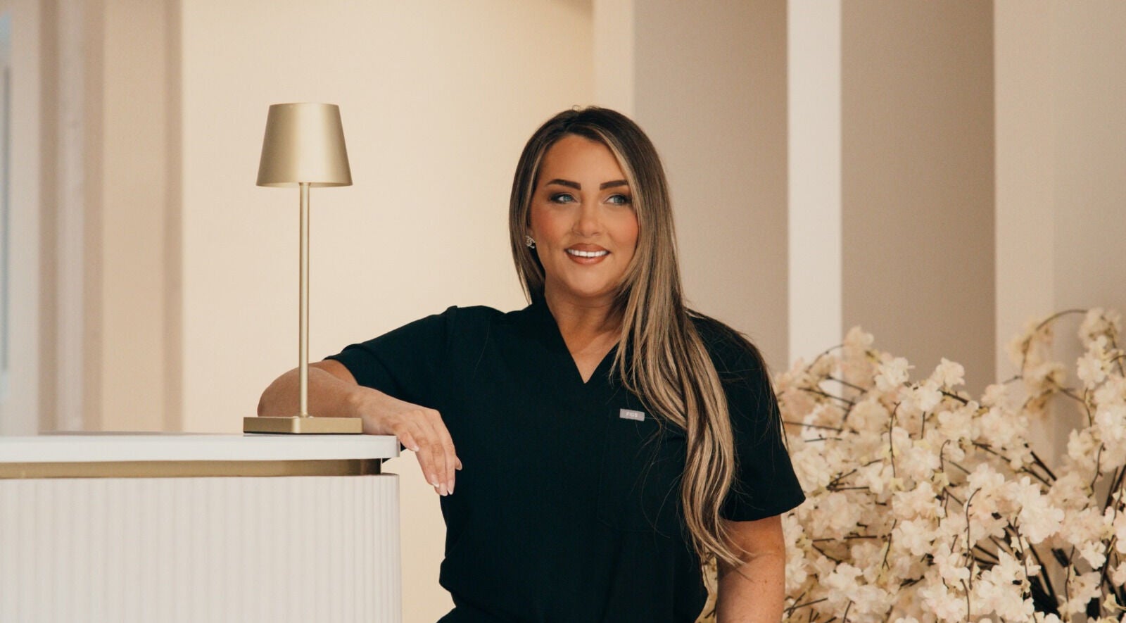 Stylish reception at Aphelia Aesthetics, Barrow Upon Soar, England. Professional welcoming atmosphere.