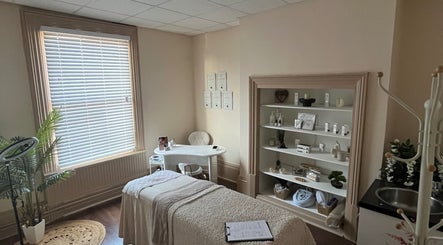 Elegant treatment room at Xela Massage and Skincare in Cottingham, England, GB featuring serene decor.