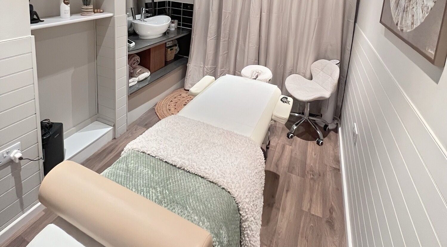 Cozy massage bed at Xela Massage and Recovery in Willerby, England, GB, offering a serene wellness retreat.