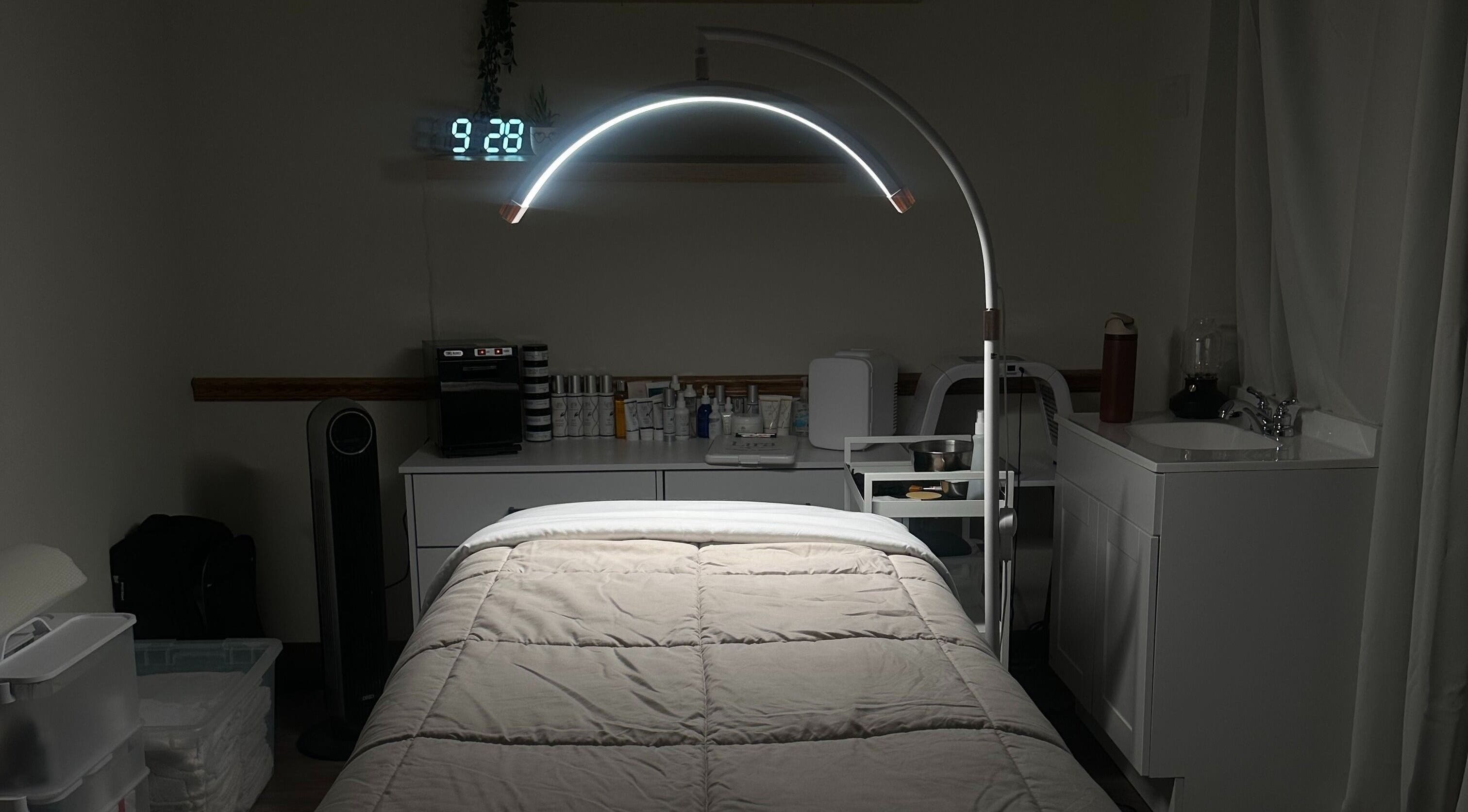 Relaxing treatment room at Earnest Esthetics in San Mateo, California, US, featuring modern wellness equipment.