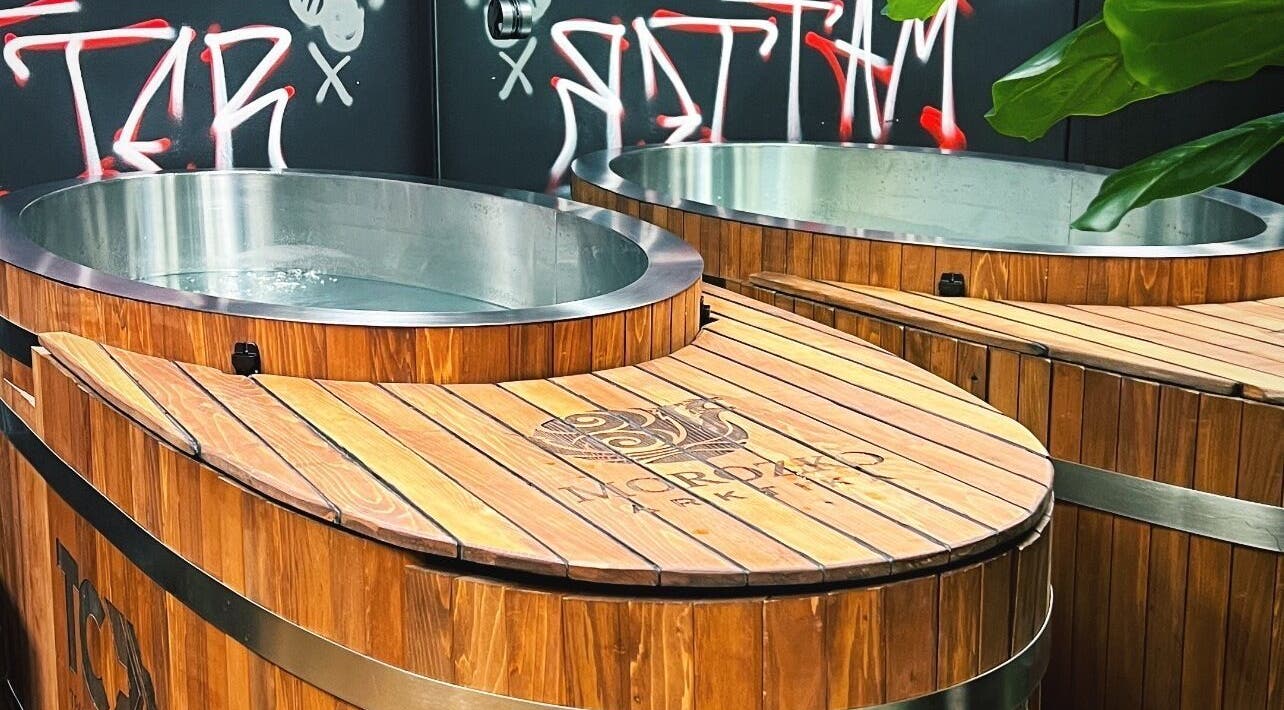 Wooden hot tubs at Transformation Columbus in Powell, Ohio, US offer a relaxing spa experience.
