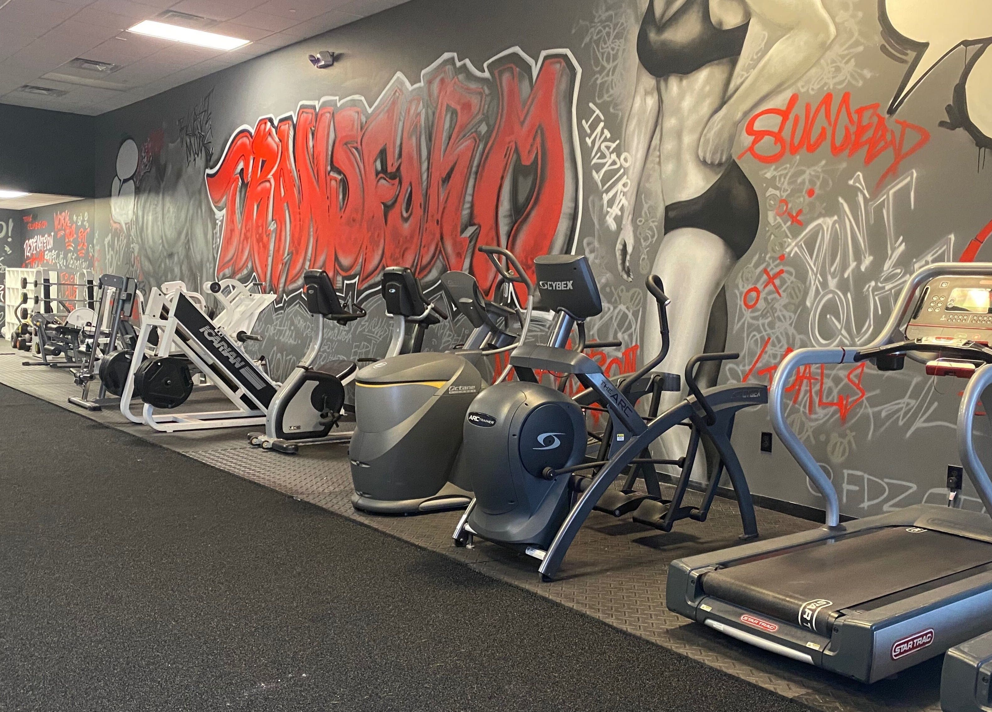 Modern gym with graffiti walls at Transformation Columbus, Powell, Ohio, US.