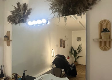 Chic salon interior at BABE Aesthetics, Billingham, England with stylish decor and beauty setup.