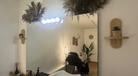 Chic salon interior at BABE Aesthetics, Billingham, England with stylish decor and beauty setup.