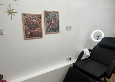 Modern beauty treatment room at BABE Aesthetics, Billingham, England, GB with stylish decor and comfortable chair.