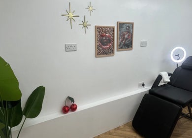 Modern aesthetic room at BABE Aesthetics, Billingham, England, GB, featuring stylish decor and a comfortable treatment chair.